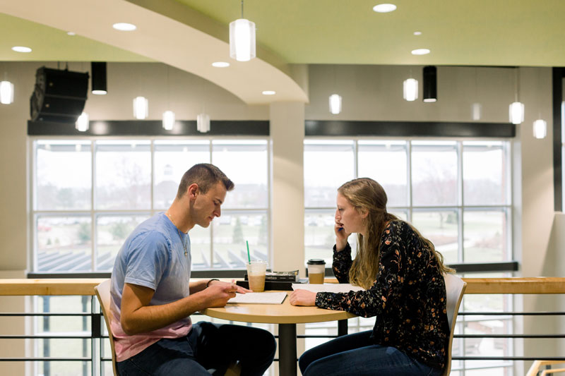 Two students studying over coffee in the LaRita Boren Campus Center