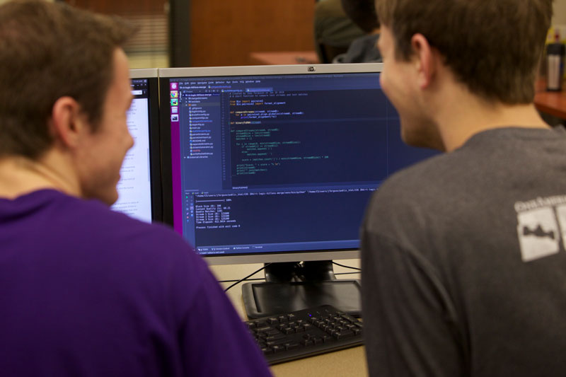 Two students pair programming