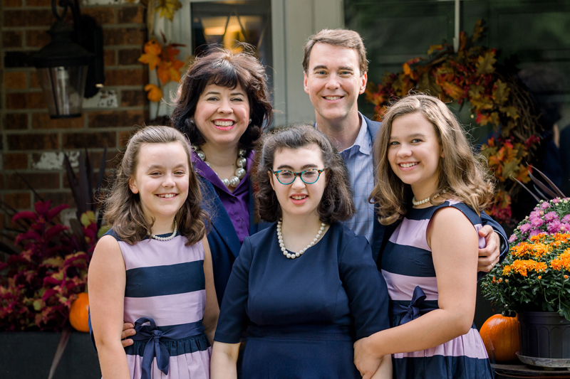 president lindsay with his wife and three daughters