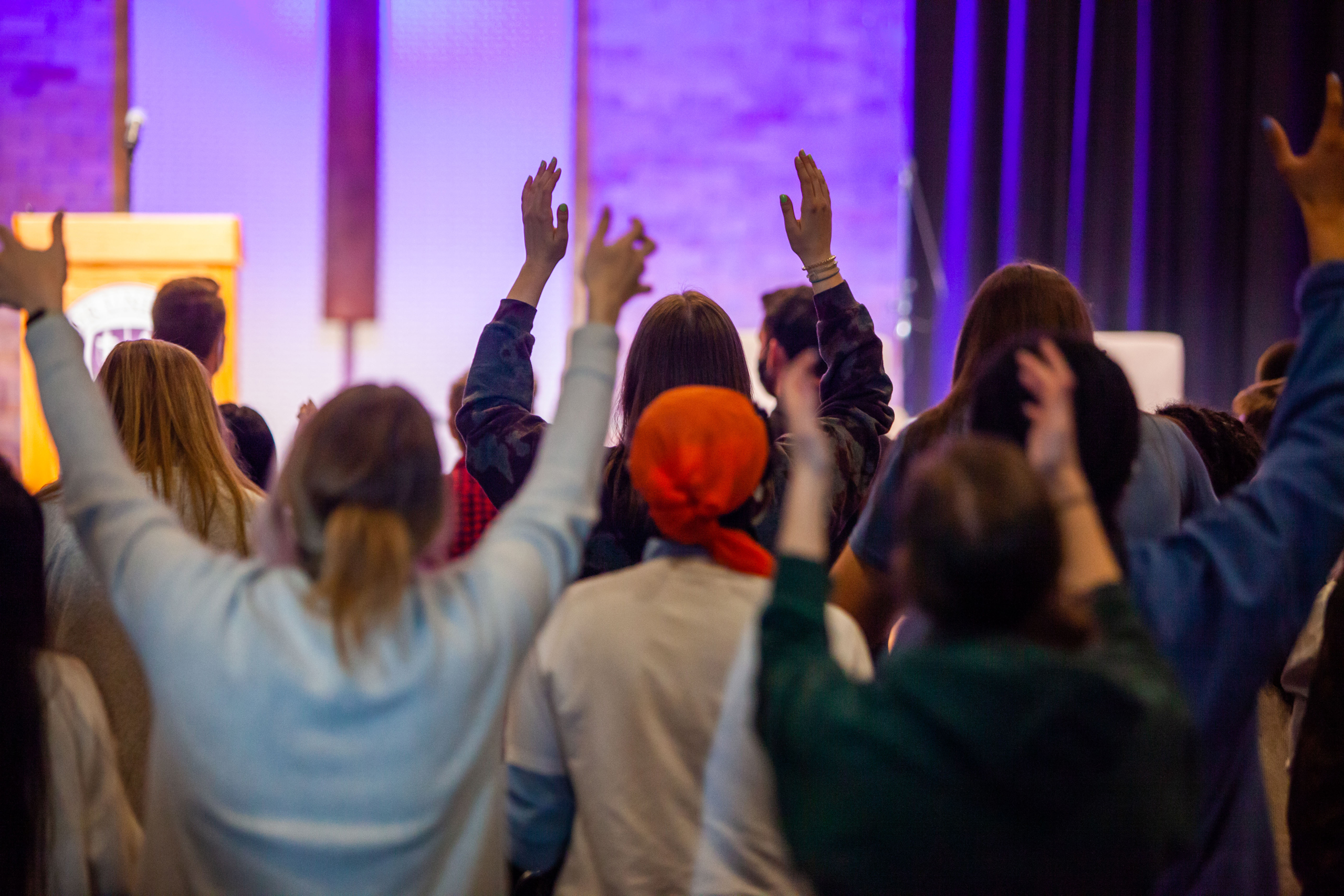 students worshipping in chapel