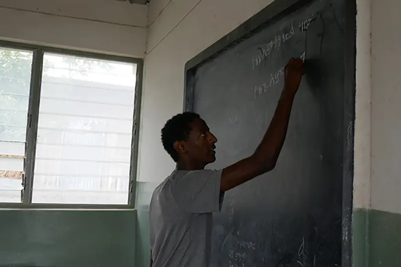 Gerber writing on a chalkboard