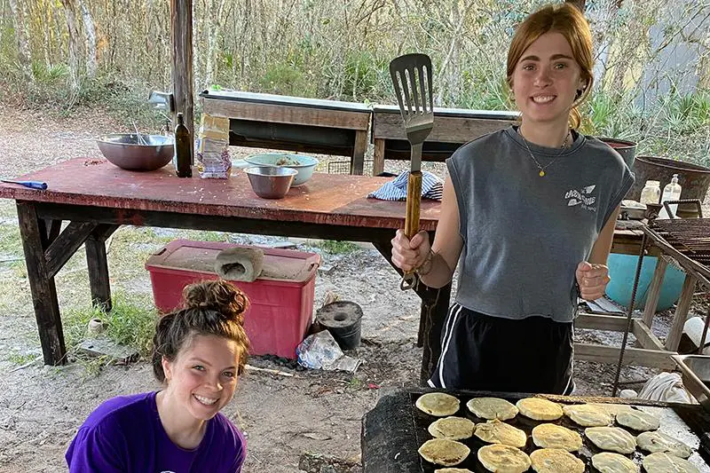 Students making pancakes