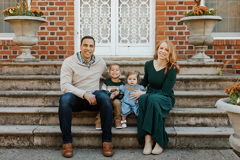 Makar family sitting on steps