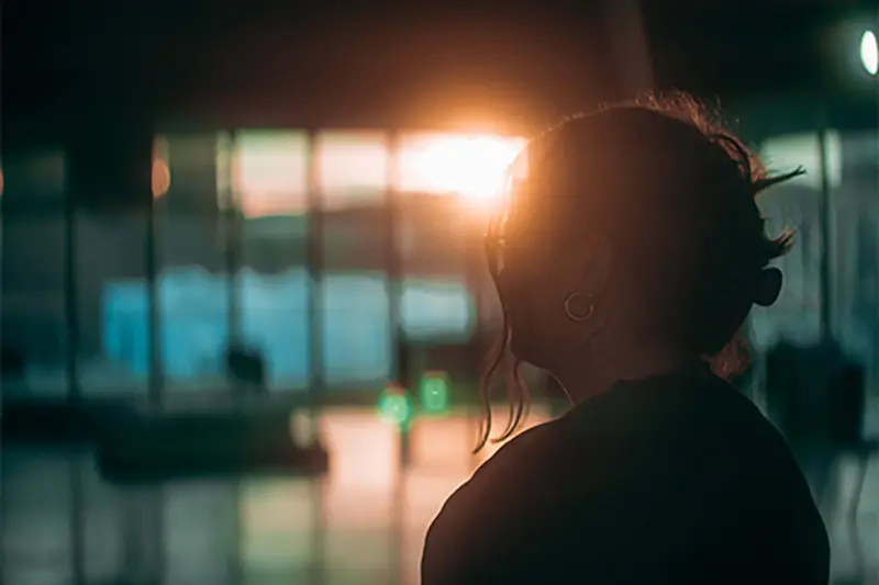 Student inside of the dome at sunset