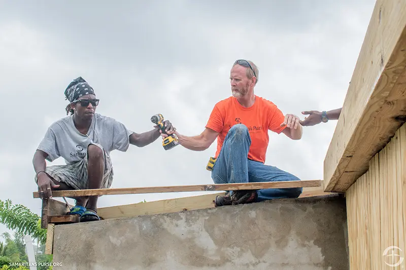 Workers on a roof