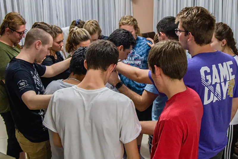 Team photos from previous or current year (Robert Brandkamp’s team), photos of students in different countries, photos of Lighthouse classroom (Euler 109 on Monday nights.)