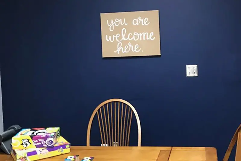 Wall art that says "You are welcome here"