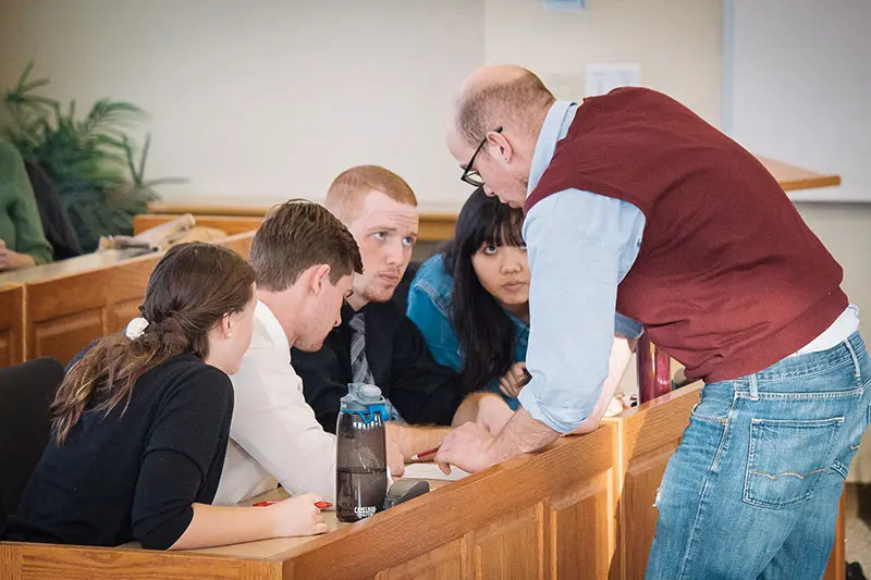 Students deliberating in Ethics Bowl