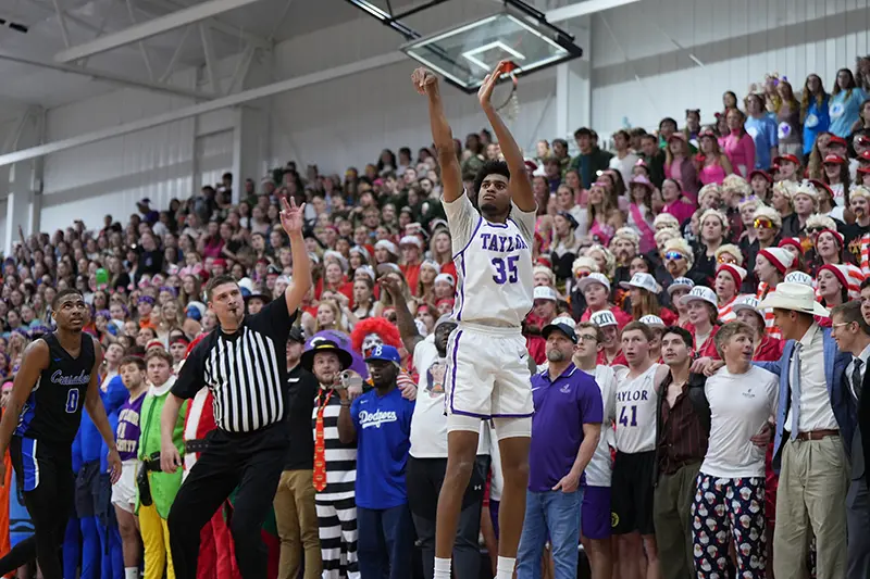 Taylor basketball player scores 