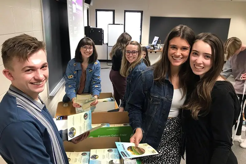 Public Relations students display nonprofit campaign materials