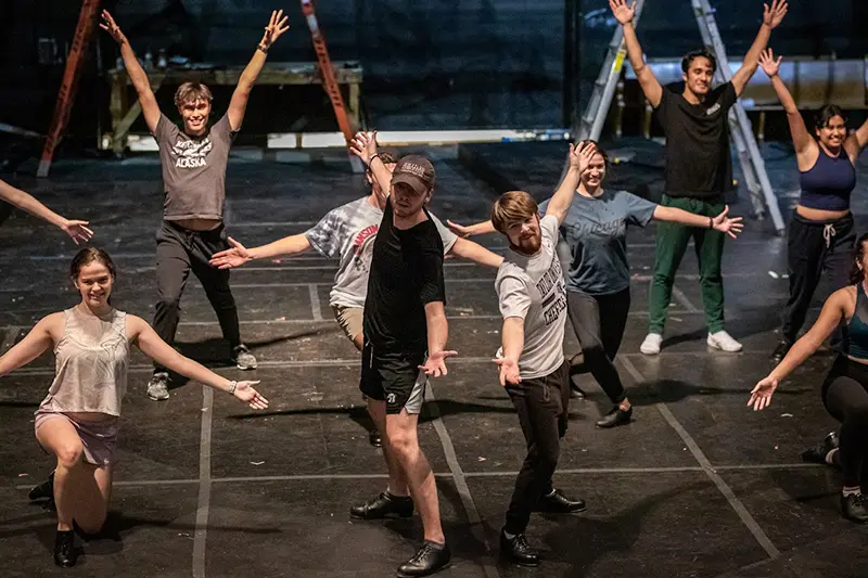 cast of White Christmas at a rehearsal